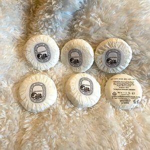 Six brand new Diptyque mini soaps. Phylosykos scent. 1.1 oz each.
